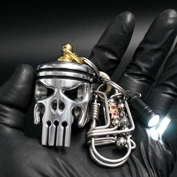 Piston art skull keychain (pendant\/flashlight\/bottle opener)